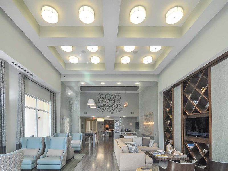 This image shows a modern interior design featuring a café lounge with complimentary Starbucks Coffee and Apple. The charming lamp adapted the sophisticated and elegant decoration.