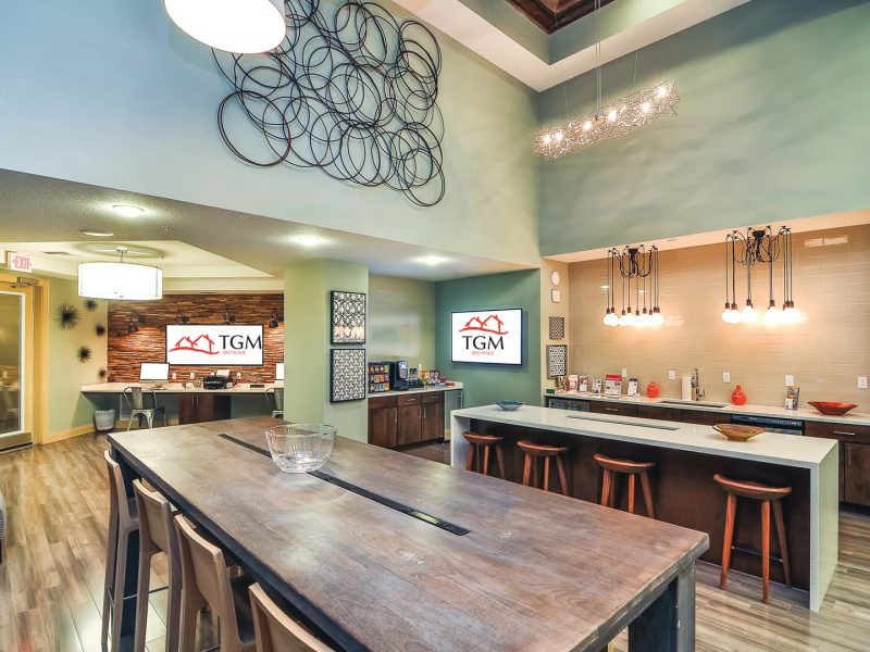 This image shows the TGM Ibis Walk Apartment Clubhouse with a resident lounge and Wi-Fi. A café lounge with complimentary Starbucks coffee and Apple computers.